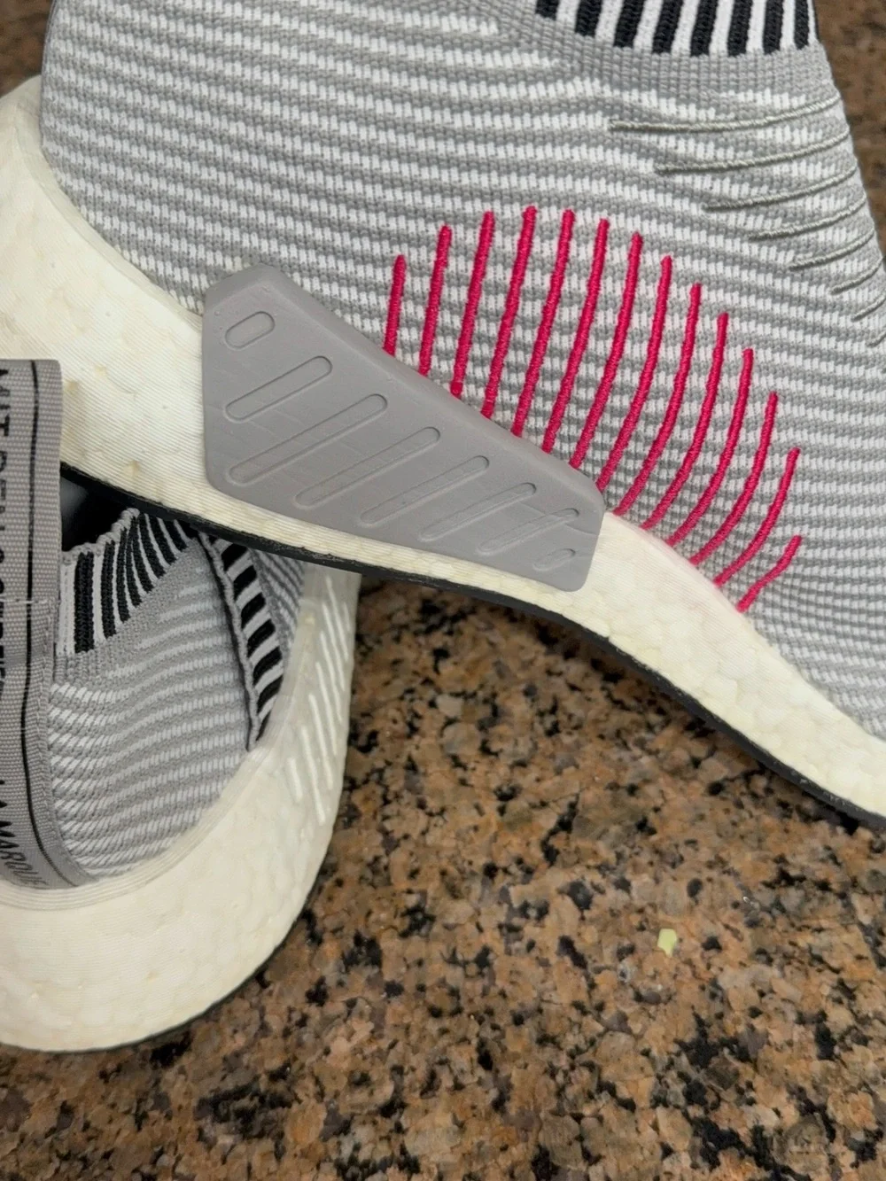 adidas White and Black Slip-On Knit Sneakers with Red Accents